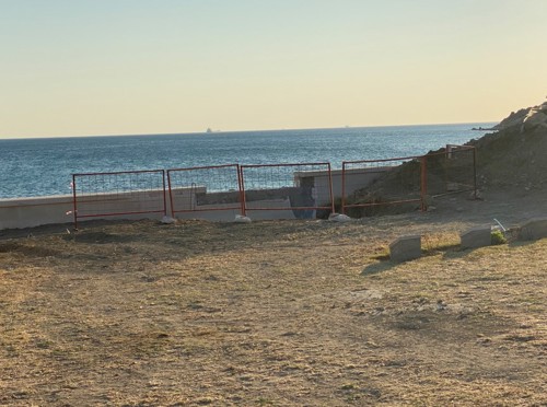 Excavation behind the front wall in V Beach Cemetery